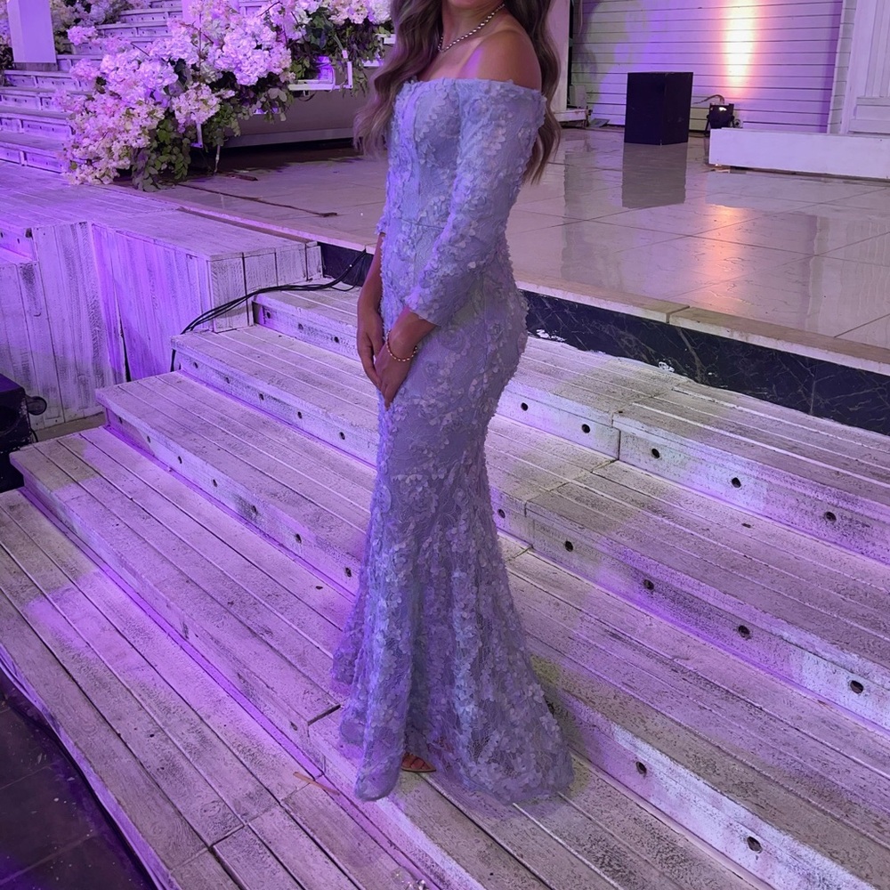 XSCAPE Lace Maxi Evening Gown. Size 4. Color in light blue.
